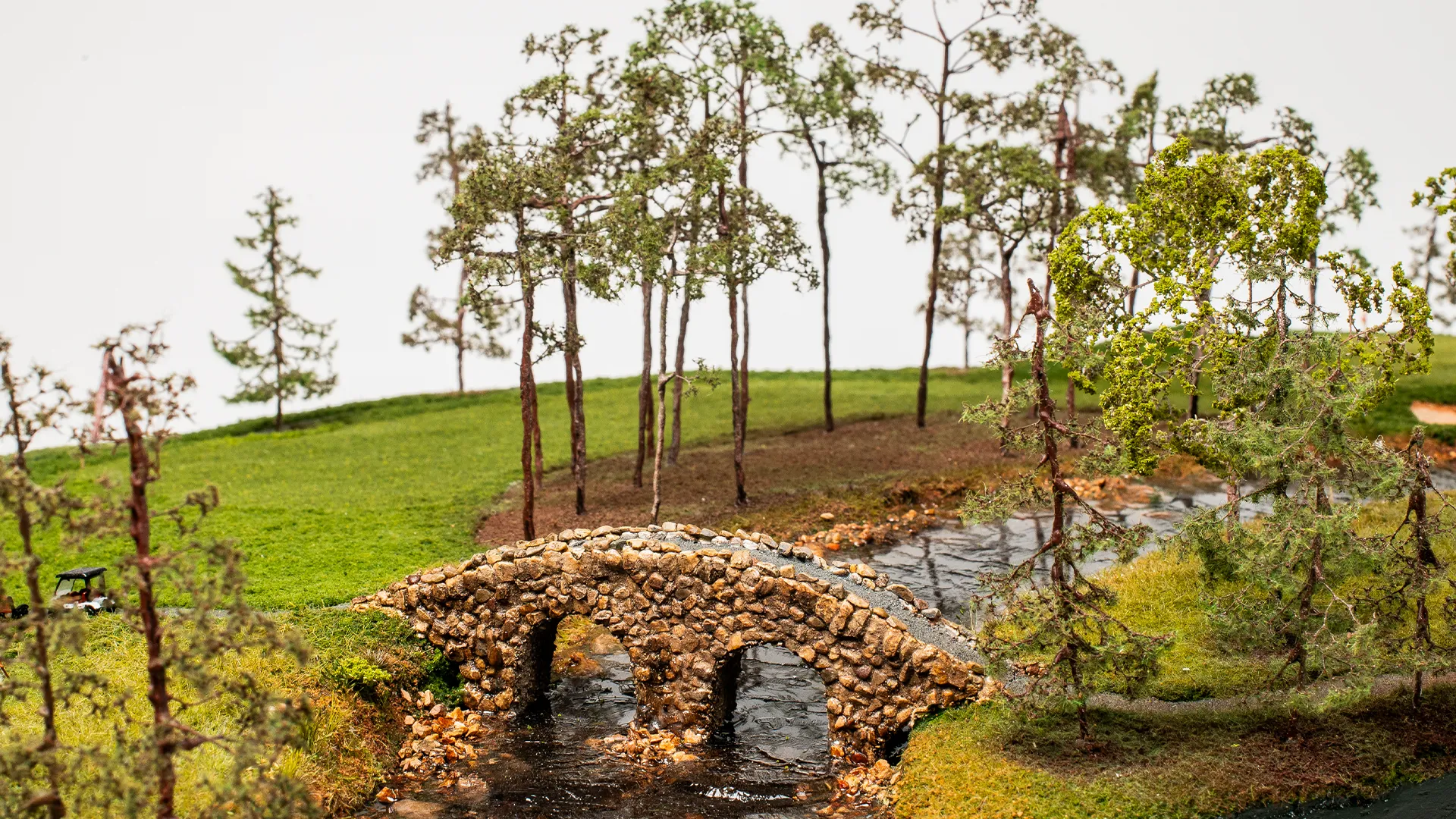 pine-barens-country-club-hole-17-close-up-of-bridge-mobile-micro-landscapes Miniature model bridge at Hole 17, Pine Barrens Country Club, built with precision detail