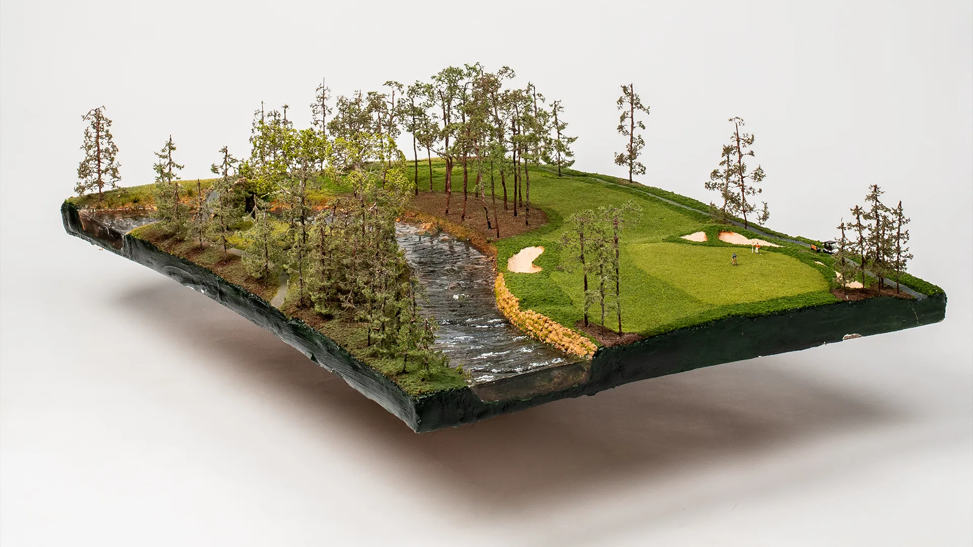 Ultra-realistic miniature green of Pine Barrens Hole 17 with hand-painted textures 1:160 size view from green