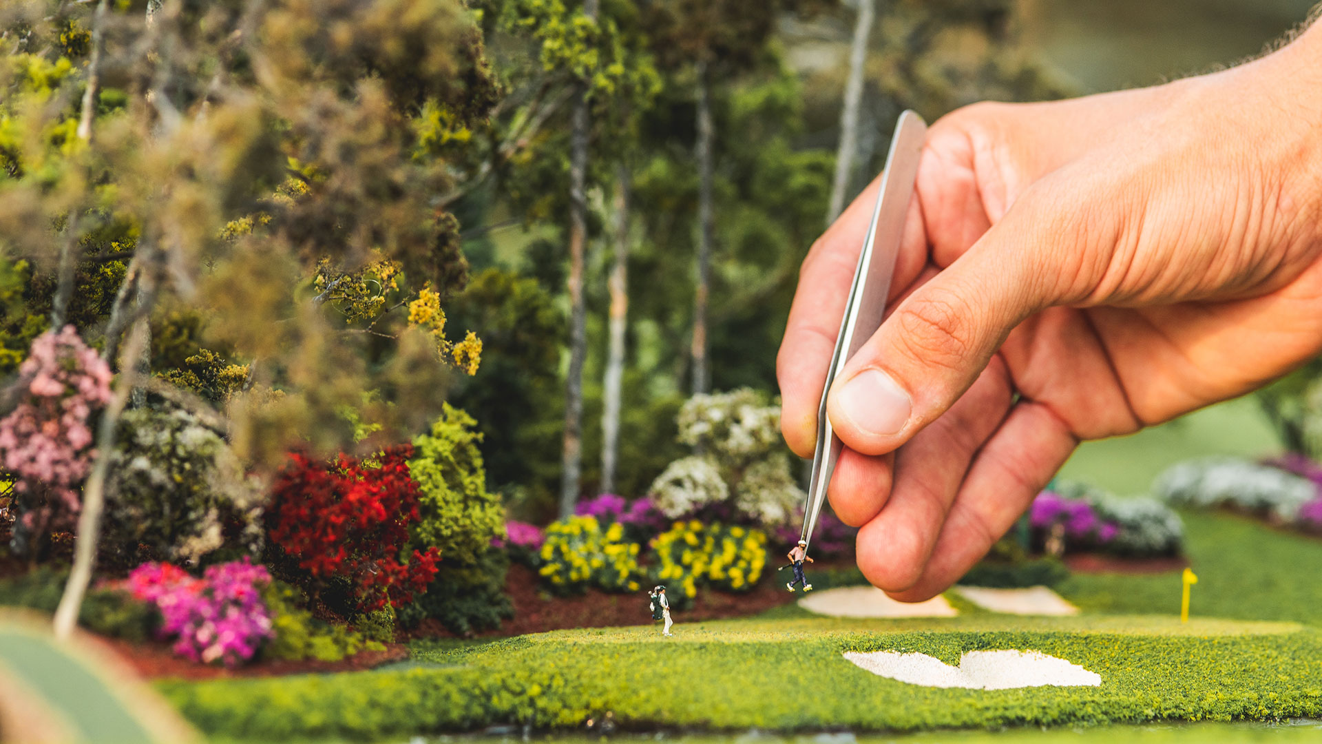 Fine Artist Placing Golfer on Micro Landscape