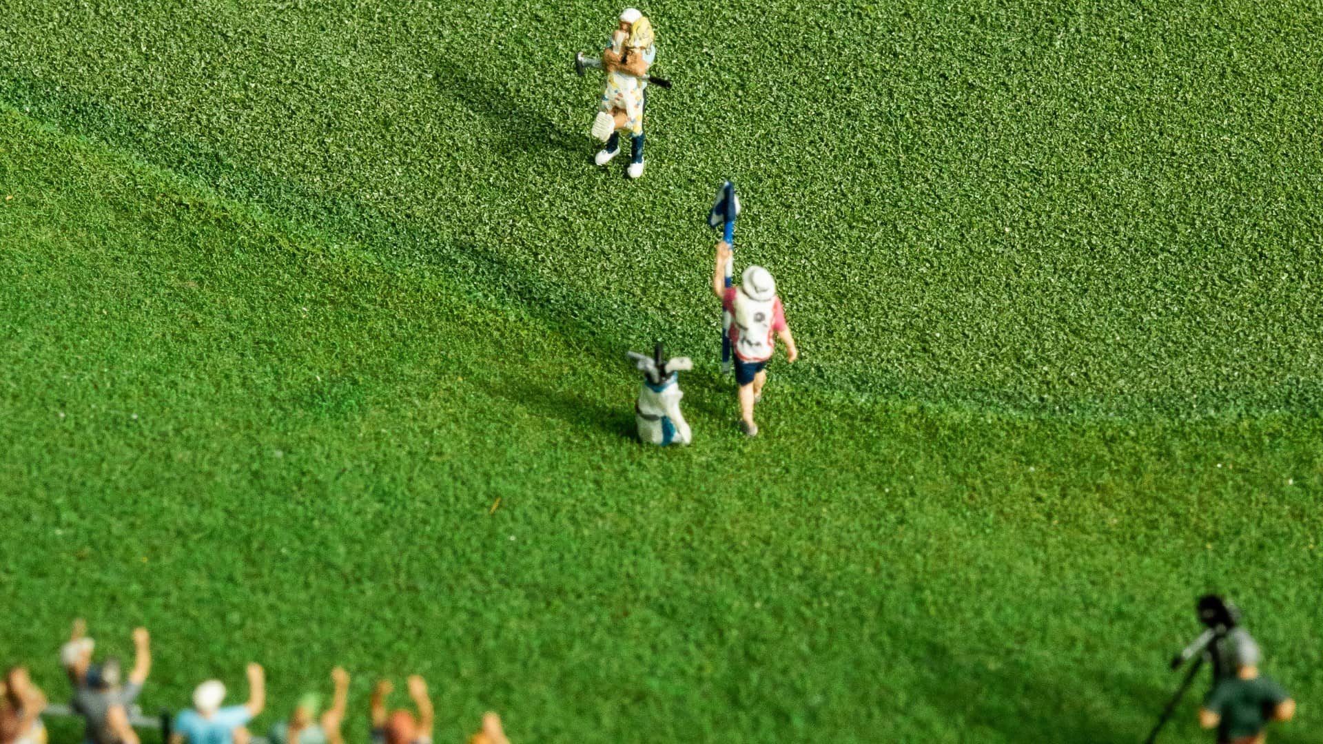 Micro Landscape close up of Ben Griffin celebrating victory on 18th green during a recreated championship moment