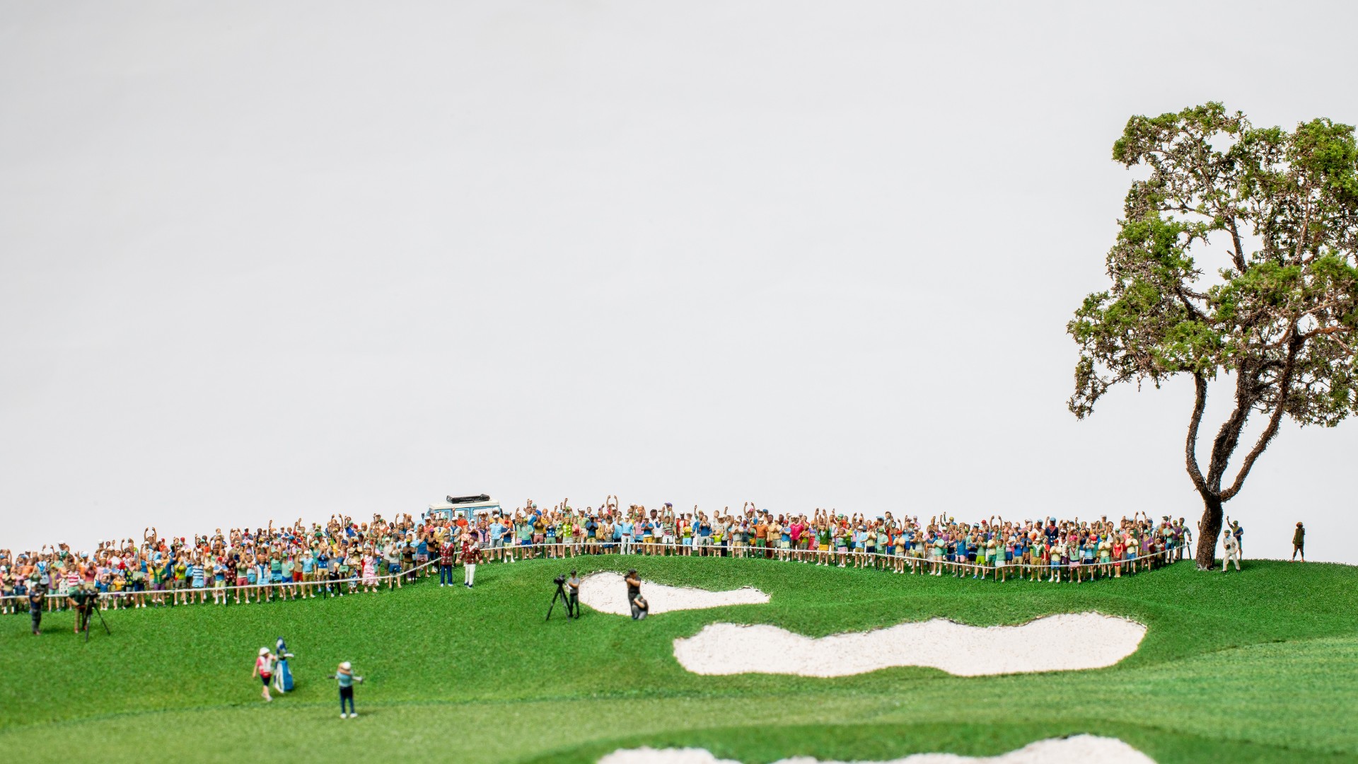 Hand-painted spectators gathered around a PGA Tour victory scene