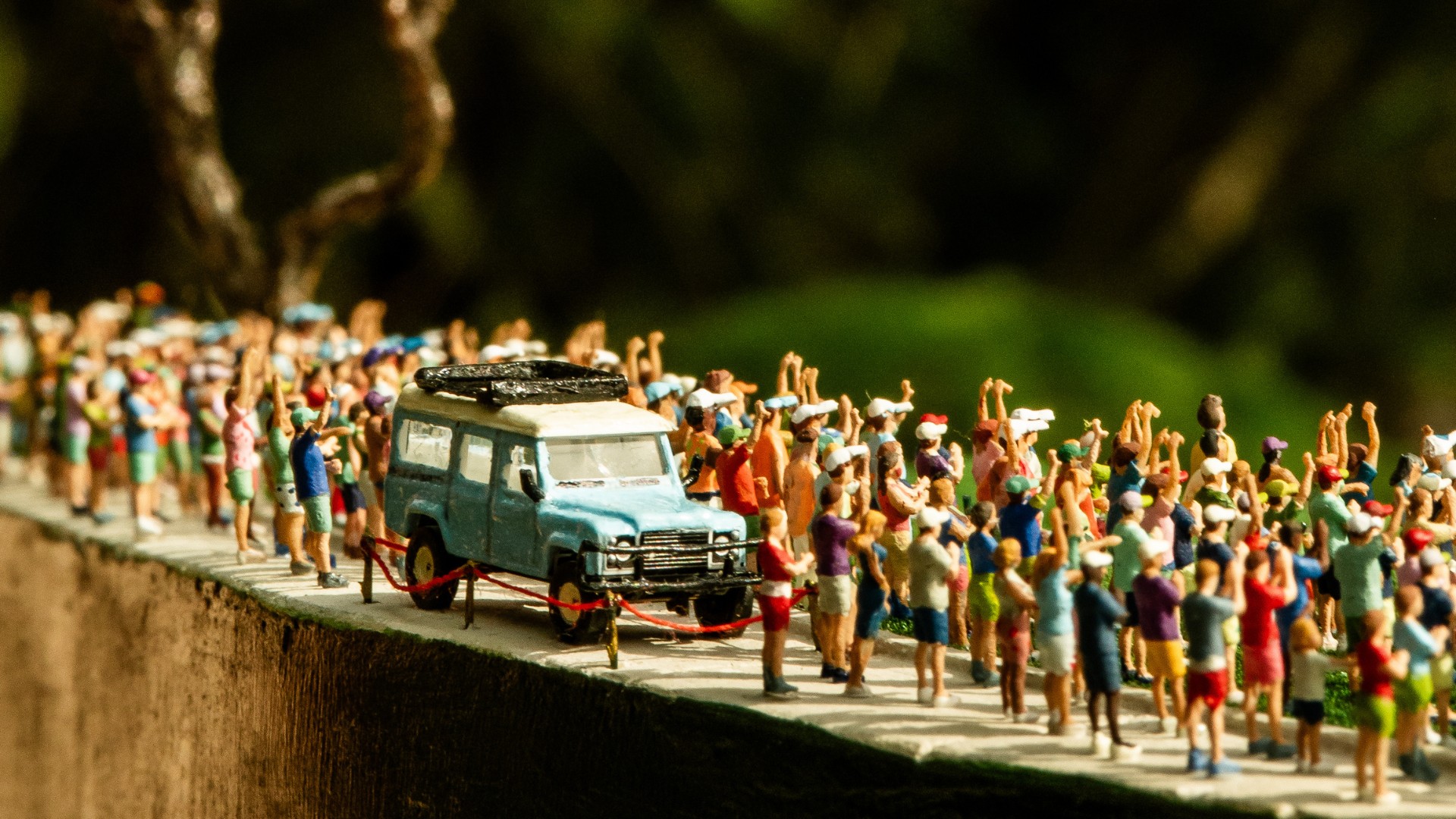 Miniature 1992 Land Rover Defender featured in a handcrafted golf course replica