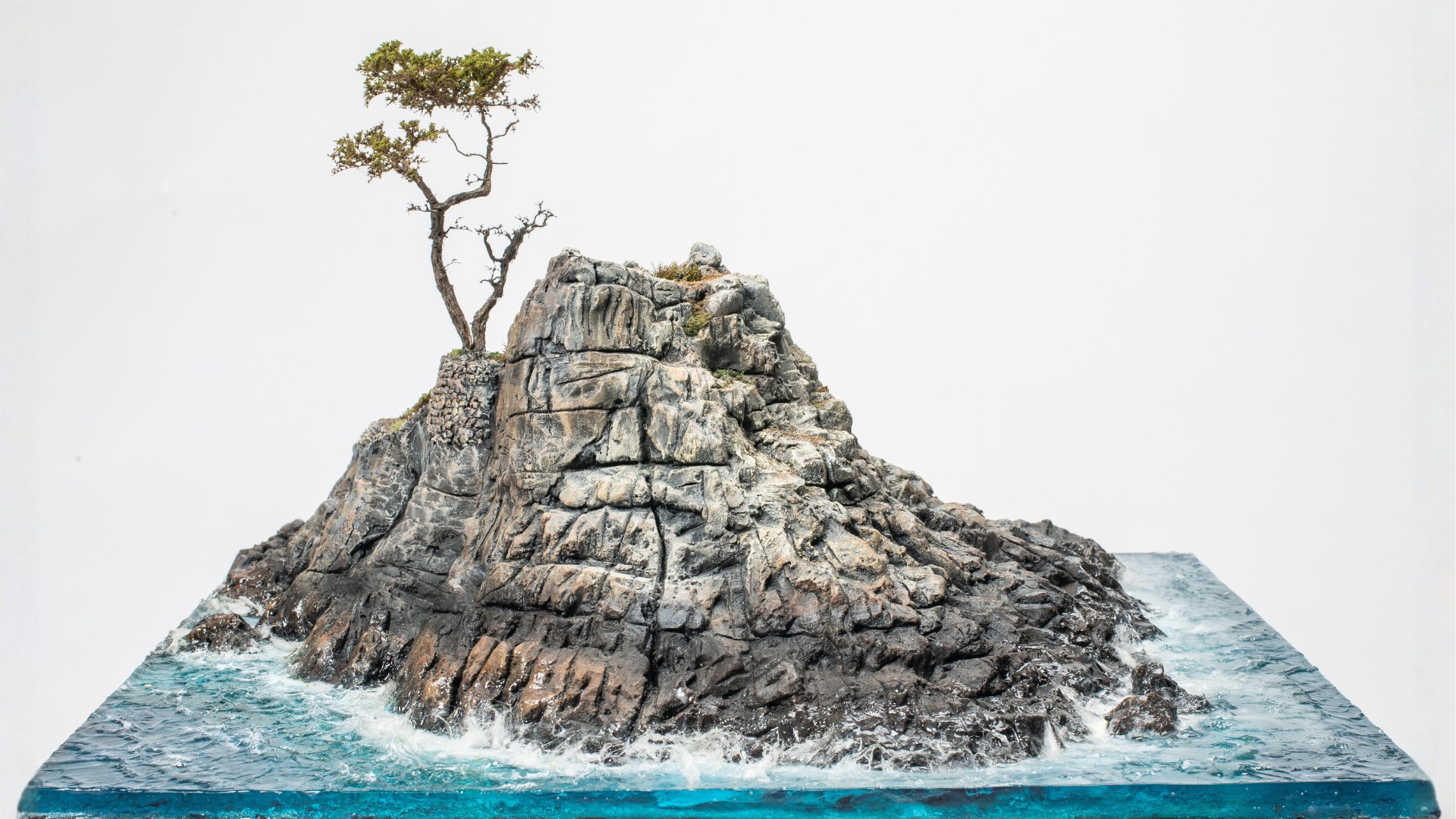 Handcrafted miniature landscape of the Lone Cypress overlooking the Pacific Ocean in Pebble Beach, California
