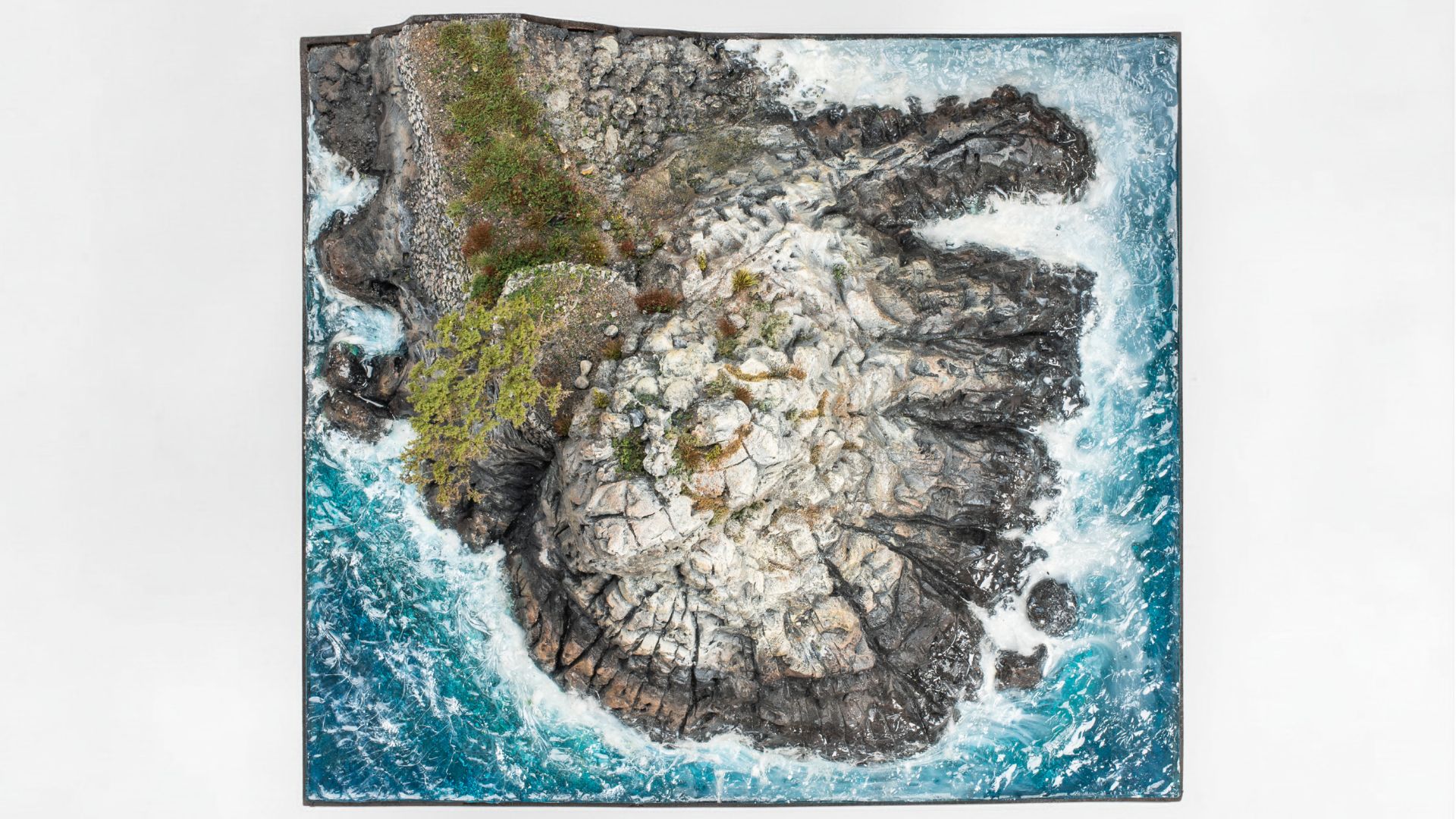 Handcrafted granite cliff textures recreated in a Lone Cypress miniature landscape aerial view